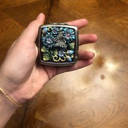 Vintage open up portable mirror with blue butterfly
