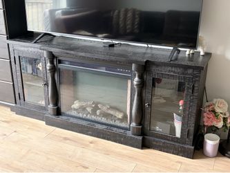LG TV + fireplace stand