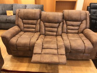 Brown sofa and loveseat set