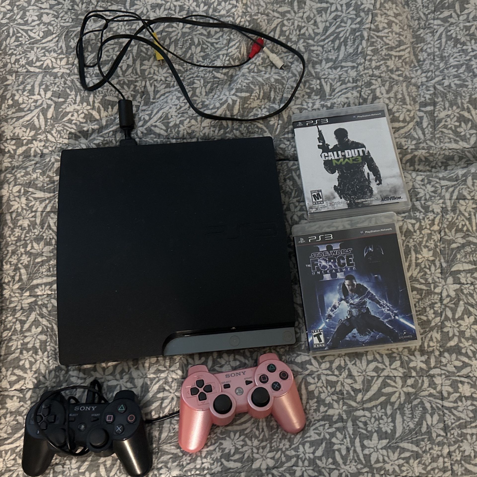 PS3 With Games And 2 Remotes