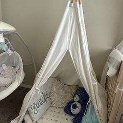 Indian tent with mattress and pillows