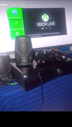 Xbox 360 with Halo wars and a monitor