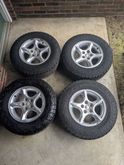 16" Jeep Star Aluminum Wheels And 235/70/16 Lancaster LS-37 A/T All Terrain Tires Set