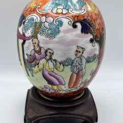 Porcelain antique table lighter made in Japan wooden stand