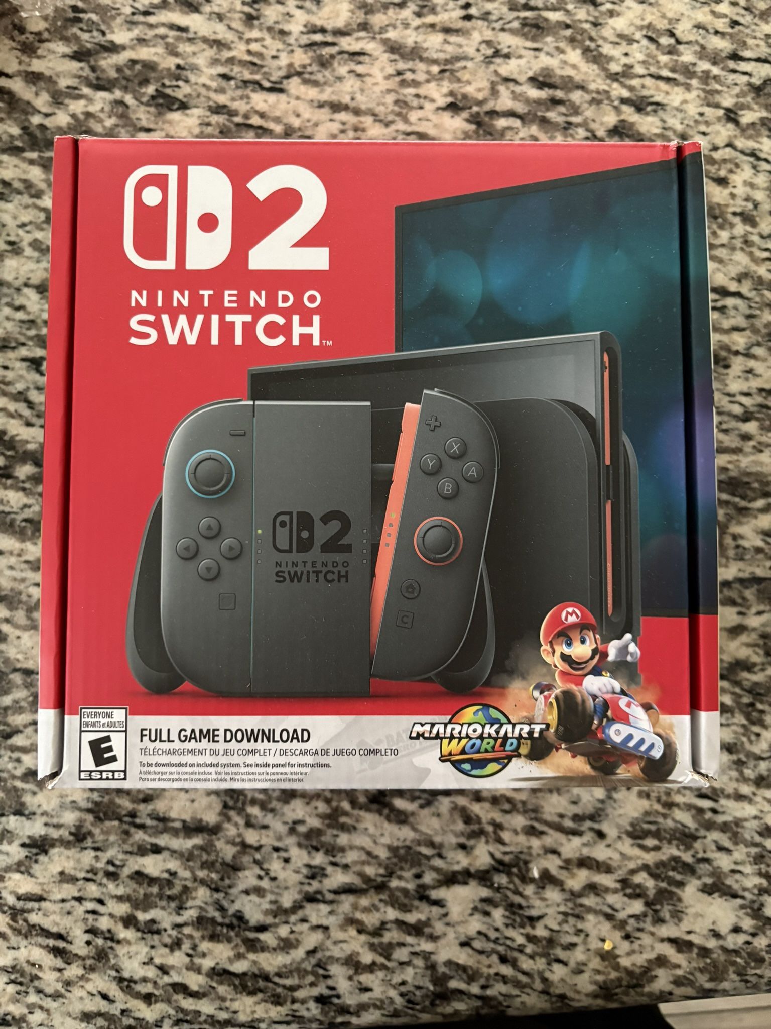Nintendo Switch 2 With Mario Kart World Bundle In Hand