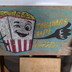 hand drawn and painted movie night wood sign