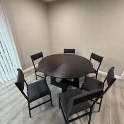 Round dining table and chairs