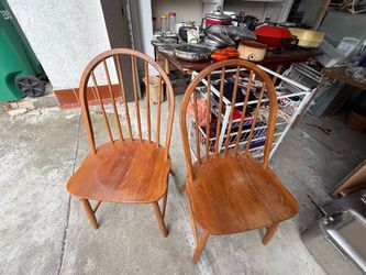 Two solid wood chairs