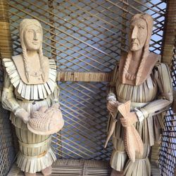 Hand carved wood and corn shuck Indian figures  