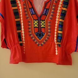 2 brand new womens shirts.  One size.  Red and yellow color both $15