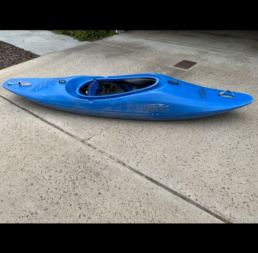 Necky Jive - surf kayak/whitewater kayak. Size Small. A kayak paddle is included.
