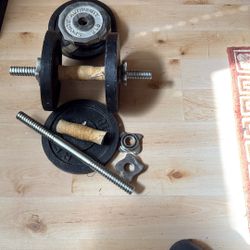 Set Of Adjustable Dumb Bells.  4 10lb Plates 4 3 Lb Plates.