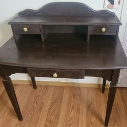 brown desk with top shelf