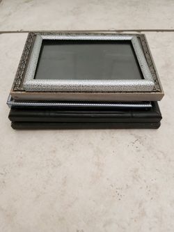 Stack of Black and Gray Vintage Frames