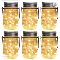 GIGALUMI Hanging Solar Mason Jar Lights, 6 Pack 30 Led String Fairy lights Solar Lanterns Table Lights, 6 Hangers and Jars included. Great Outdoor Law