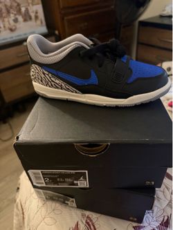 Jordan Legacy 312 low black & blue size 2Y