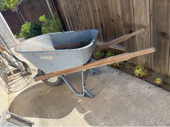 Wheel barrow, metal blue , construction , concrete
