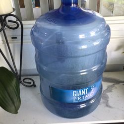 Handy  5 Gal. Bottle Use It For Water Or Plants