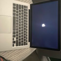 2015 MacBook Pro (not set up) (comes with charger)