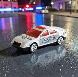 2004 Matchbox Burger King Promo #2 Police Car White W/Red Tint Die-Cast 1:64 Toy. This is a 2004 Matchbox Burger King Promotional #2 Police Car. It is