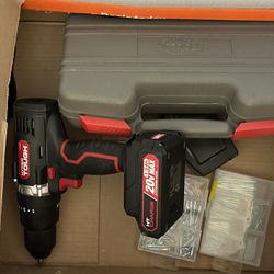 Drill With Screws, Nails, And Attachments Plus Battery And Charger 