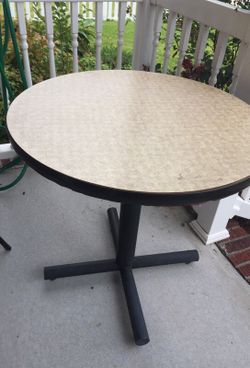 Sturdy metal table with formica top