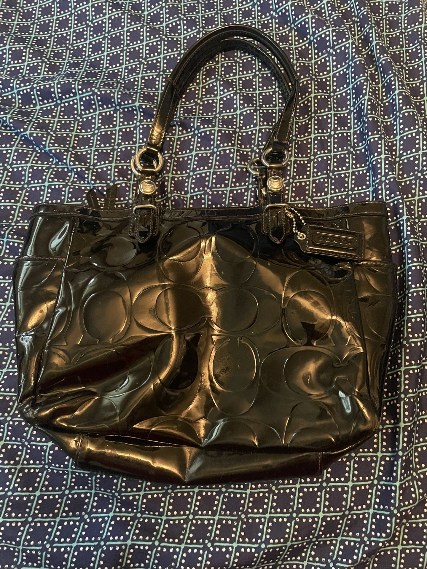 Medium Size Shiny Black Coach purse, silver hardware