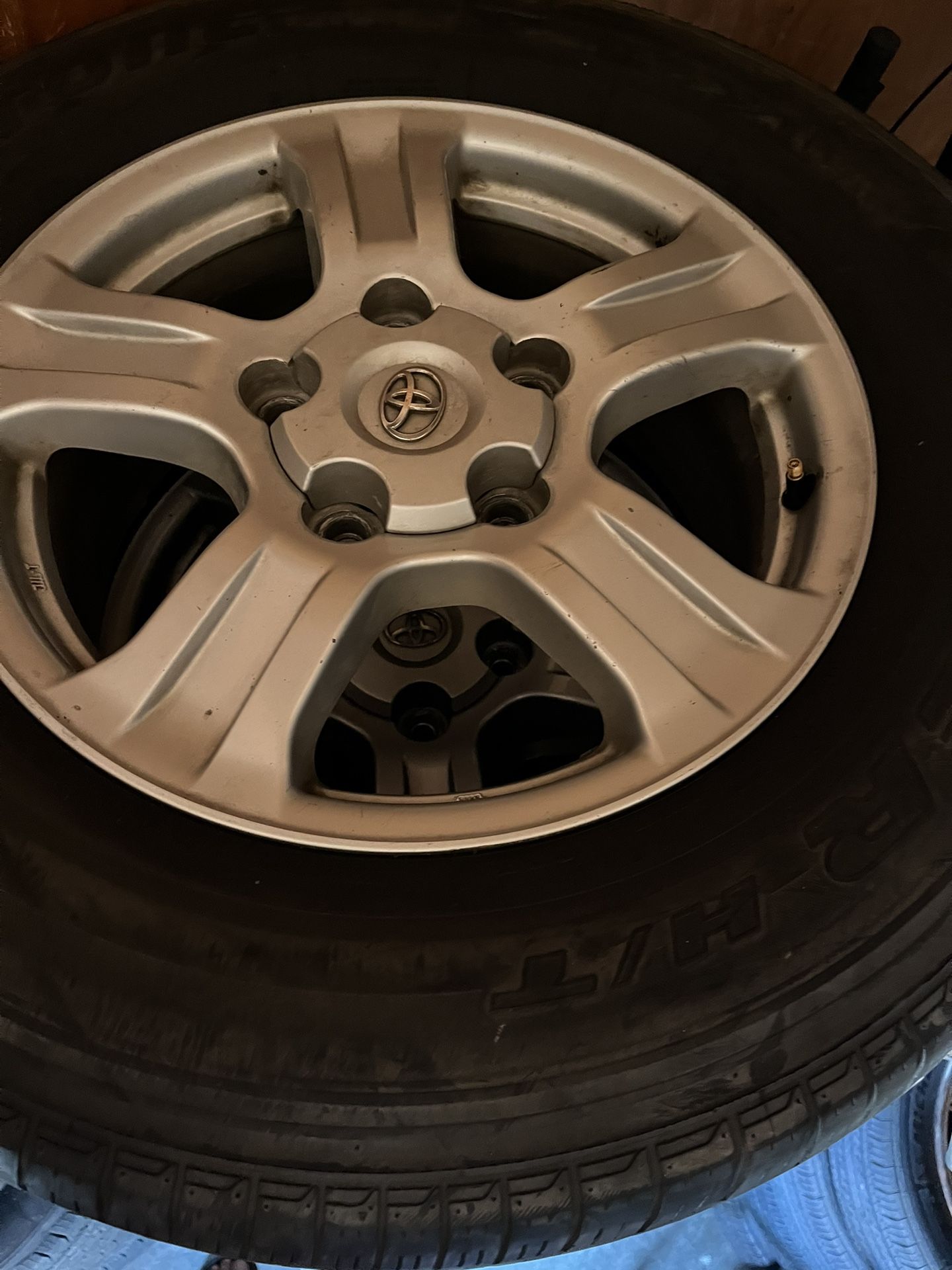 wheels and tires for toyota tundra 5 lugs good condition 75% good