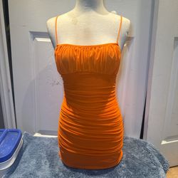 Vibrant orange ruched bodycon mini dress 