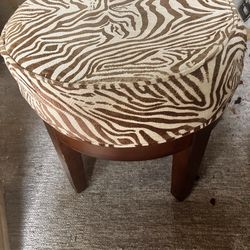 Zebra on wood stool