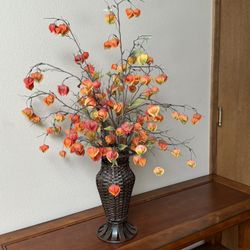 Fall Flower Arrangement In Wrought Iron & Wicker Vase