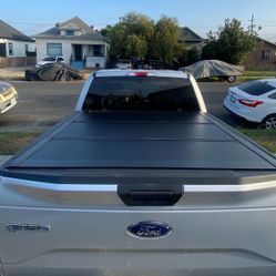 2015 to 2025 Ford F-150 5.5ft Flush Low Profile Hard Tri Fold Bed Cover