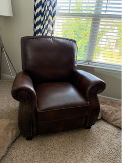 Brown faux leather recliner