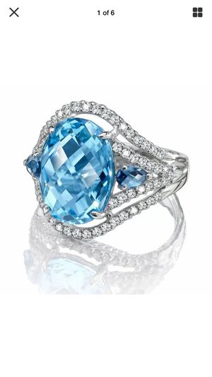 Photo Oval Aqua marine Ring on swirled open setting with pave set sapphires on .925 sterling silver band sz7