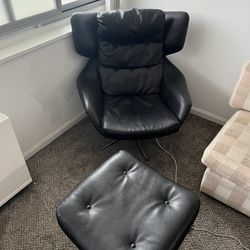Black leather chair and footrest combo