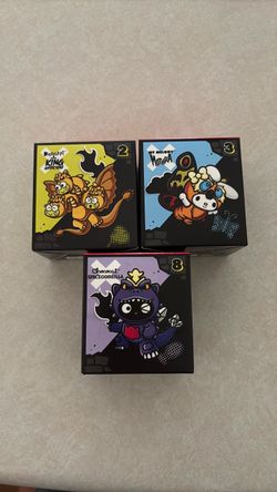 McDonalds hello kitty x Godzilla toy