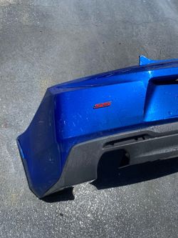 Camaro SS OEM rear bumper W/ diffuser & SS badge