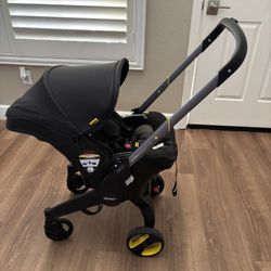 Doona Travel System Car Seat & Stroller