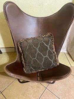 Brow faux leather chair