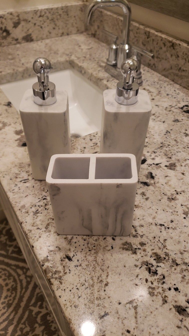 Soap dispensers
and toothbrush holder