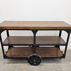 Industrial Style Solid Wooden Sofa Table With Metal Accents & Wheels