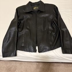Genuine leather jacket fits L & XL