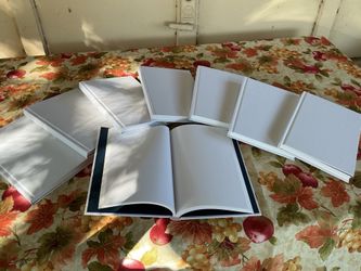 Eight Books with Blank Pages.     $20 for all.    South Austin.
