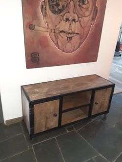 Two Entertainment Consoles