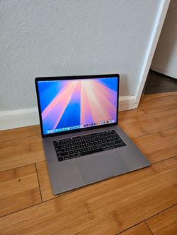 Macbook pro 15 in i7 16gb ram 256gb ssd, Adobe, ms office, charger 100% bat health or best offers