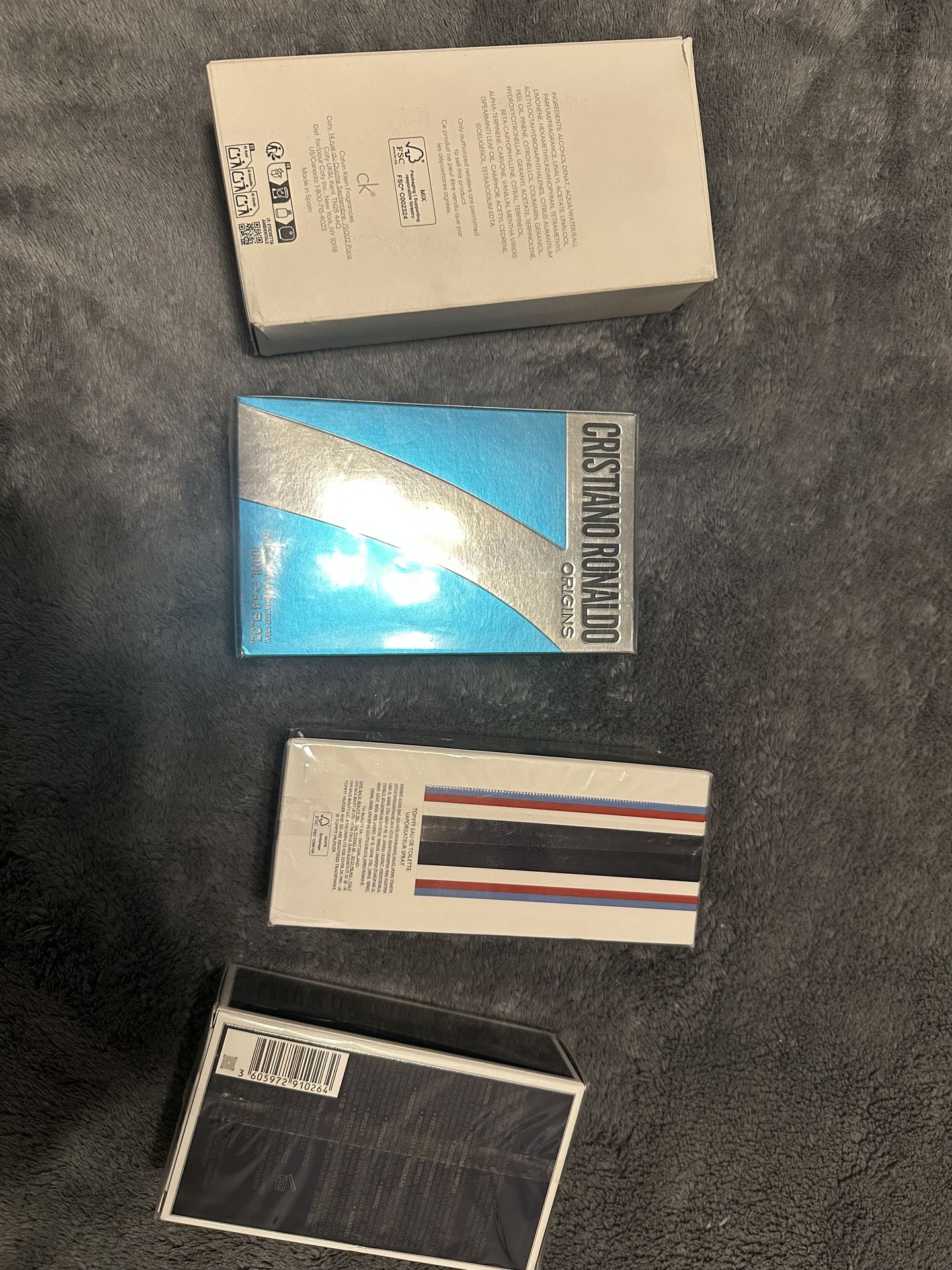 Brand new colognes big bottles .