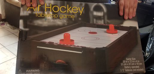 Table top air hockey