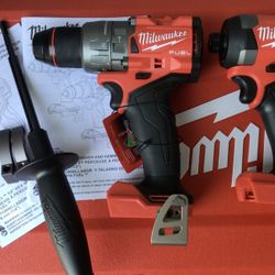 Milwaukee M18 FUEL Hammer Drill And M18 FUEL Impact Driver.  Brand NEW.  Tools Only.   NUEVO.