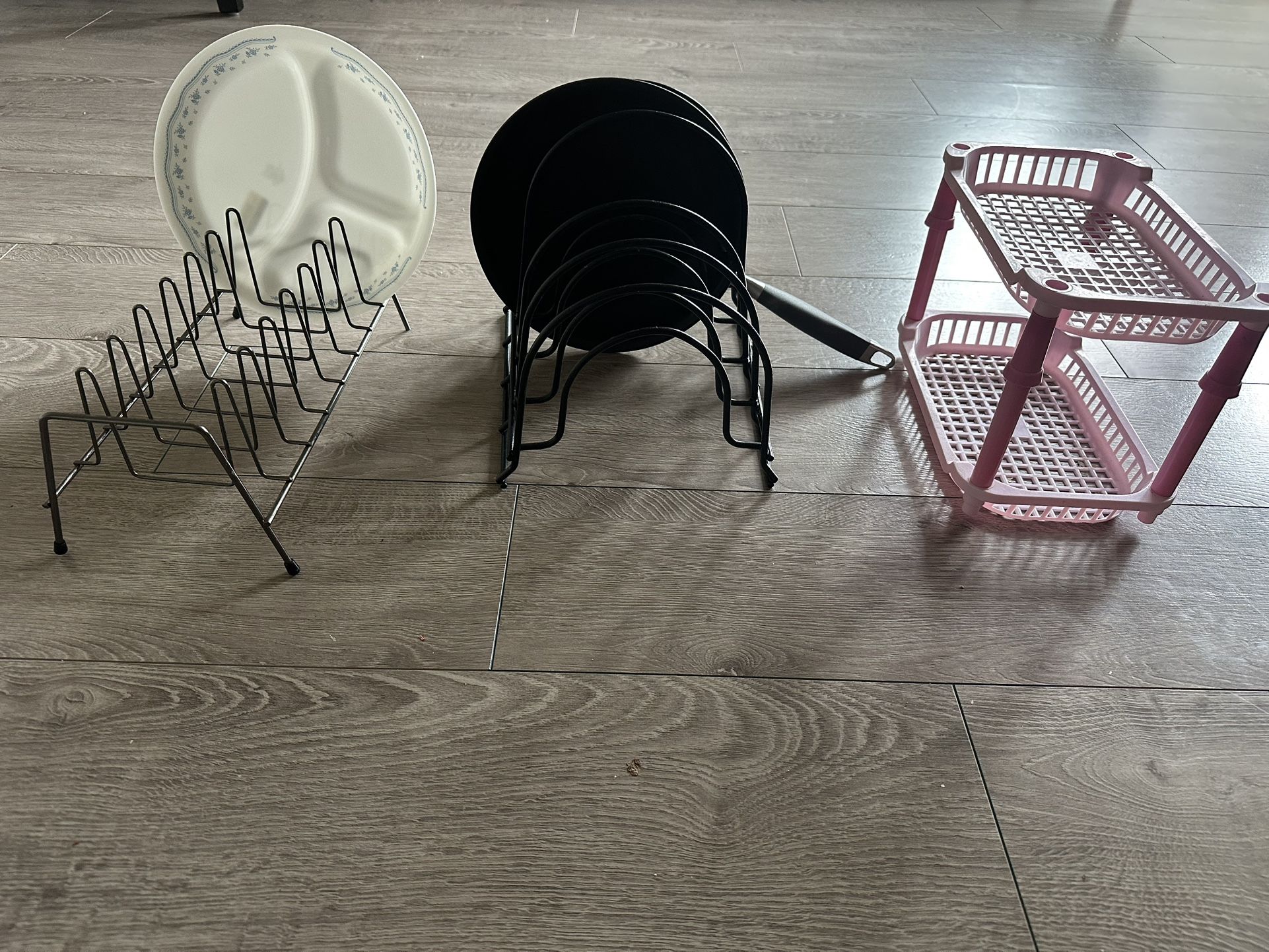 Kitchen organizers. Pan rack, dished and bowl racks, vegetable organizing basket set