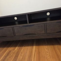 SIMPLIHOME HARPER TV STAND  on Amazon. 